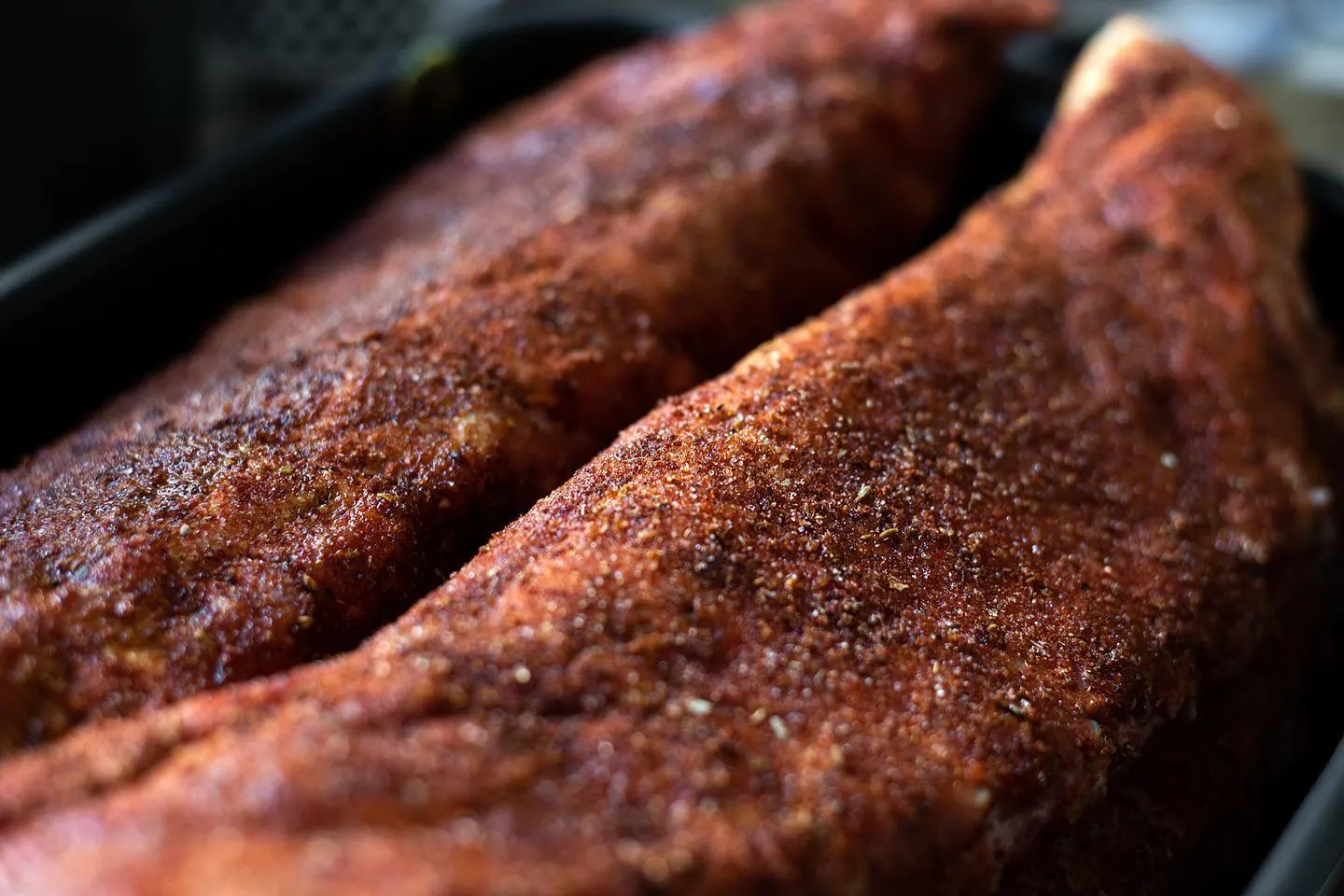 Macro of rubbed ribs with deep bark