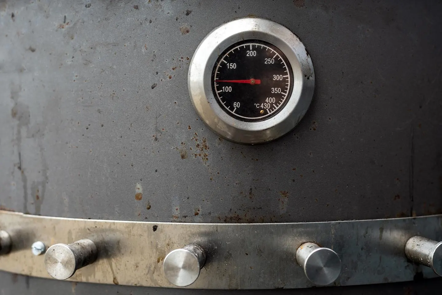 The thermometer on our smoker